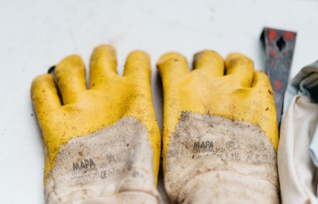 Work Gloves - pair of brown-and-yellow leather gloves