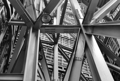 Construction Industry - Grayscale Photography of Scafoldings