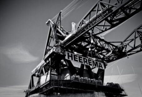Industrial Hoist - a black and white photo of a crane