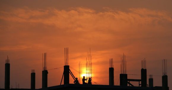 Construction Site - Silhouette of Men in Construction Site during Sunset