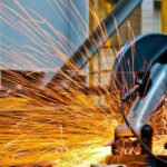 Construction - Cut-off Saw Cutting Metal With Sparks