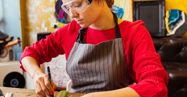 Safety Goggles - Woman Wearing Safety Goggles and Cutting Glass