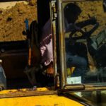 Bulldozer - Man Driving a Yellow Heavy Equipment