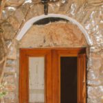 Stone House - Wooden Door on a Stone House