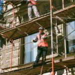 Building Industry - Men on Brown Scaffolding