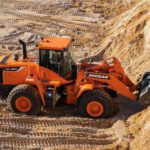 Construction Machinery - Wheel Loader Working with Sand
