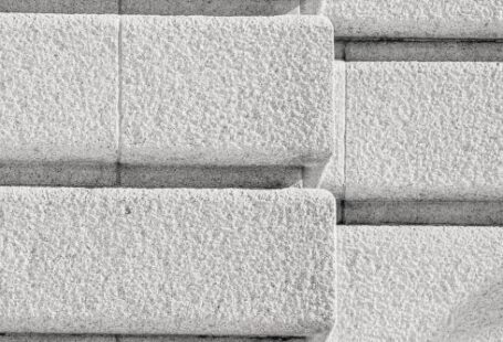 Concrete And Masonry - Corner of stone brick wall of building