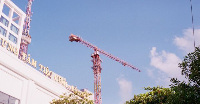 Industrial Hoist - Building Crane against Blue Sky