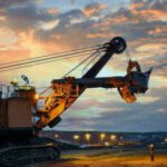 Bulldozer - Yellow and Black Heavy Equipment at the Site during Sunset