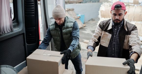 Loader - Men Holding Cardboard Boxes