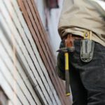 Construction Tools - Man Wearing Black Denim Pants With Carrying Hammer on Holster