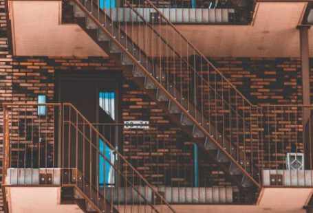 Brick Building - Brown Metal Emergency Stairs