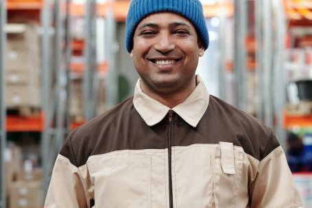 Loader - Photo of Man Wearing Blue Bonnet Smiling