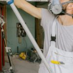 Construction Workers - Construction Workers Renovating a House